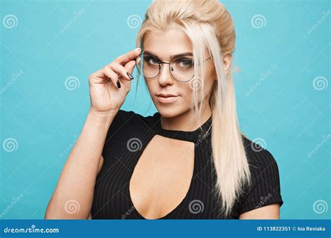Smart Blonde Girl In Glasses Isolated On Blue Stock Image Image Of