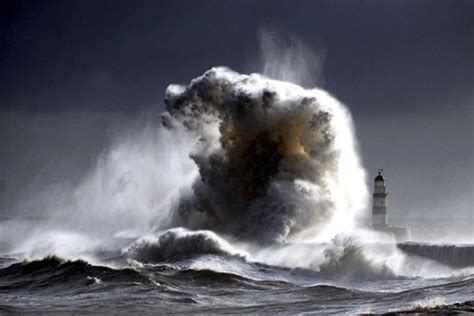 Breathtaking Photographs Of Massive Waves Crashing Against A Lighthouse