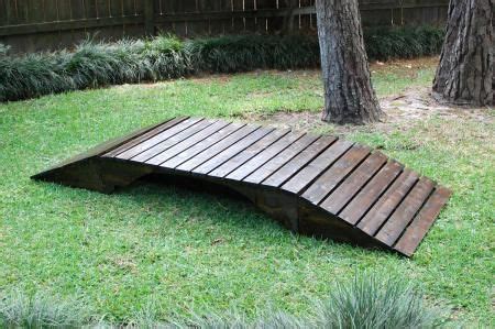 The timbers and other wooden products are used as. Footbridge | Do It Yourself Home Projects from Ana White Foot bridge for our pond ravine running ...