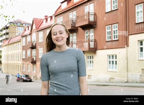 Sweden Vastergotland Gothenburg Portrait Of Young Woman In Old Town