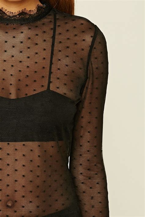 Forever Contemporary A Sheer Mesh Top Featuring A Polka Dot Pattern A Lace Trimmed High