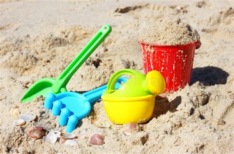 Childrens Beach Toys Bucket Spade And Shovel On Sand On A Sunny Day