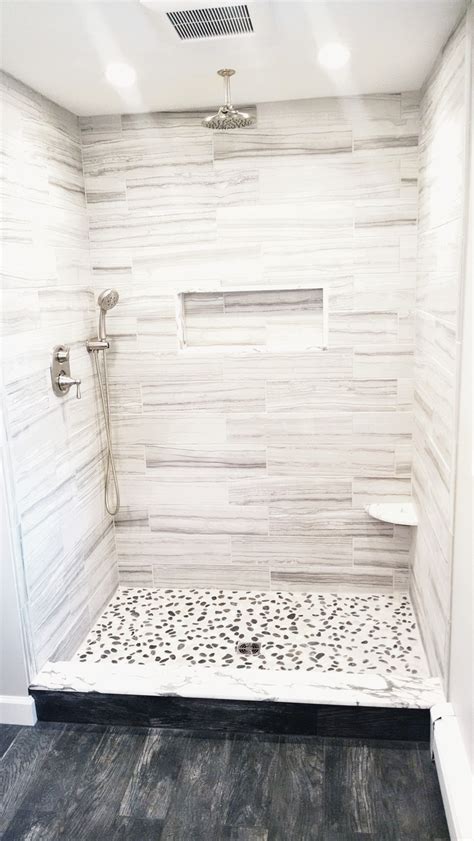 White Subway Tile Shower With Pebble Floor Pratt Sanda