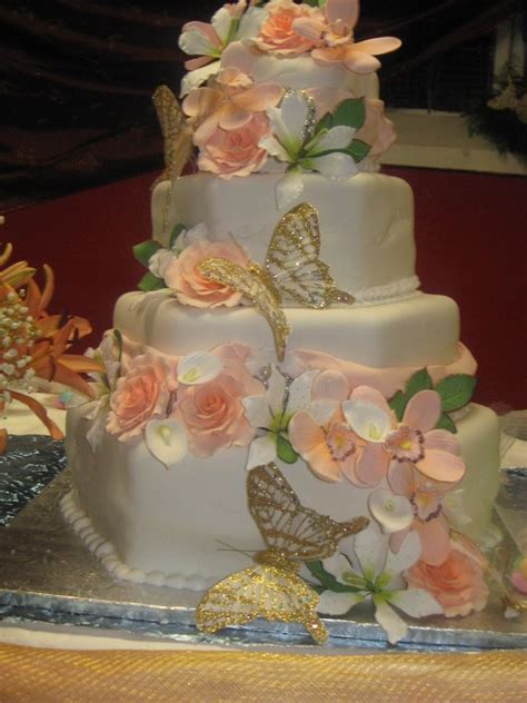 Hexagon Ivory Wedding Cake Decorated With Sugar Paste