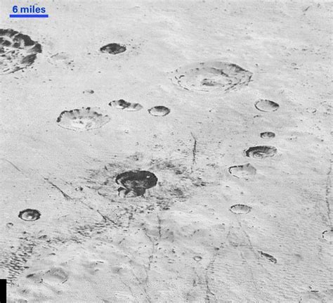 New Nasa Photos Show Plutos Surface In Eye Popping Detail
