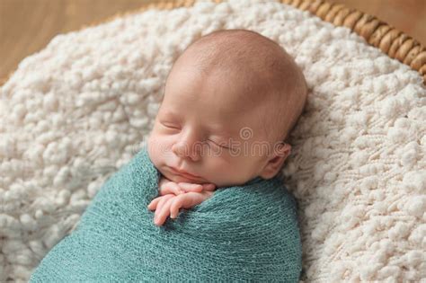 Sleeping Newborn Baby Boy Swaddled In Blue Stock Image Image Of