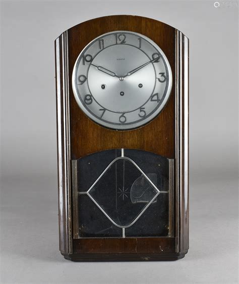 A Kienzle German Chrome And Walnut Art Deco Wall Clock 59 Cm X 33 Cm X