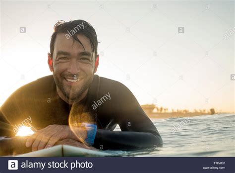 Surfer Lying On Surfboard Hi Res Stock Photography And Images Alamy