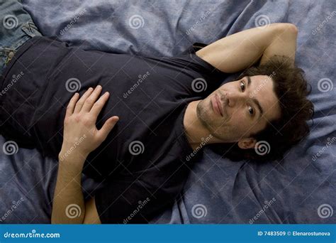Middle Aged Man Lying On The Bed Stock Image Image Of Smiling