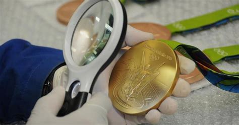 comitê organizador apresenta medalhas pódio e slogan dos jogos rio 2016 gzh