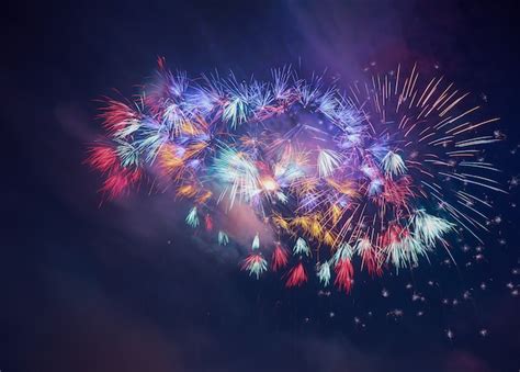 Premium Photo Colorful Beautiful Fireworks Salute Against The Dark