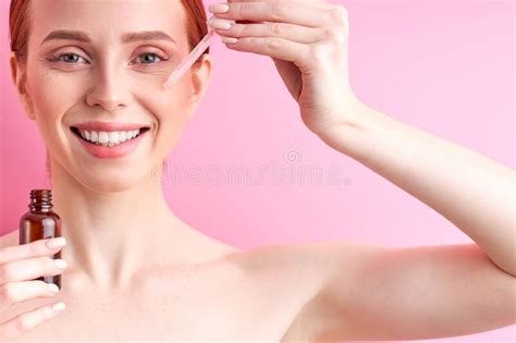 Beautiful Redhead Smiling Woman Poses With Cosmetic Product Stock Image Image Of Beauty