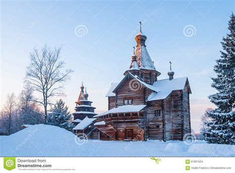 Wooden Church In Snowy Winter Forest At Sunset Editorial Stock Image