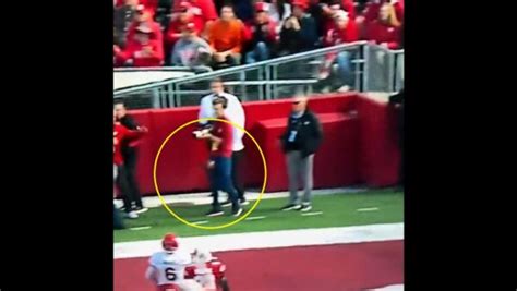 photographer gets nailed in nuts during rutgers game