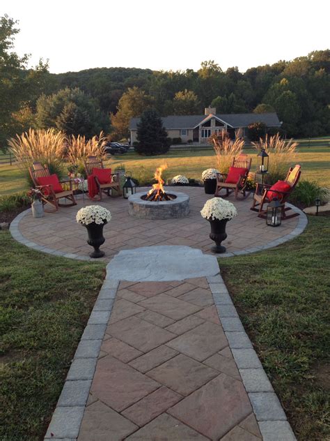 Techo Bloc Walkway Leading To Round Patio With Fire Pit Completed