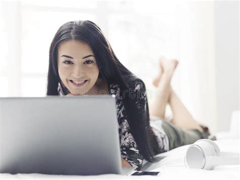 Woman Lying On Bed And Connecting With Her Laptop Stock Image Image Of Beautiful Adolescent