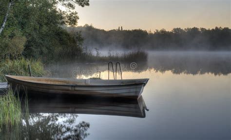 Boat On A Calm Lake Stock Image Image Of Rush Reed 35635677