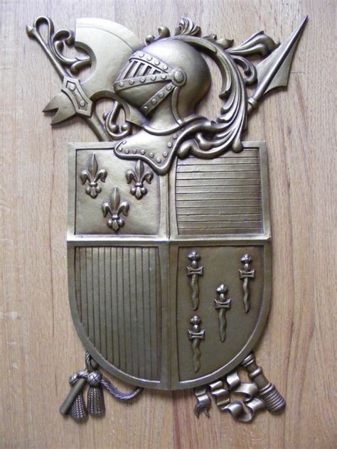 vintage cast metal sexton usa coat of arms shield knight armor