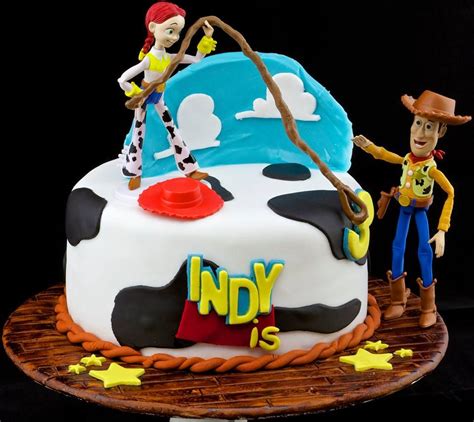 Indys Toy Story Caketopped With Plastic Jessie And Woody Figurines Toy Story Cakes Cake