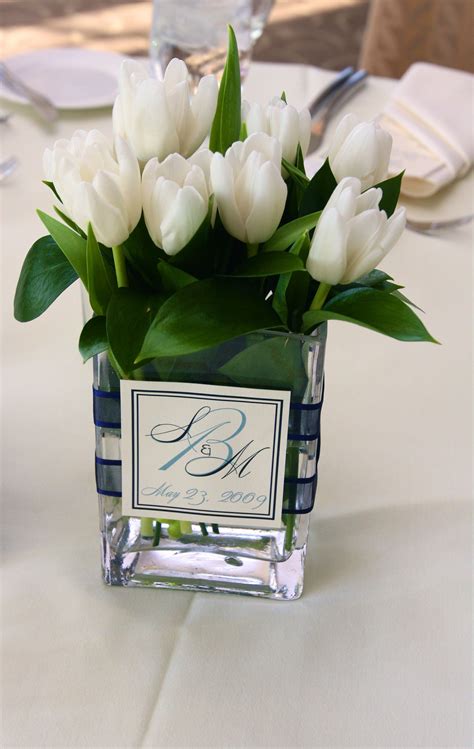 White Tulip Centerpiece With Monogram Amazing Wedding Centerpieces