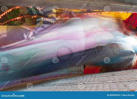 motion blur of people riding fast carnival ride editorial stock image image of fast