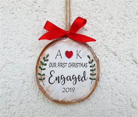 26 unique gifts for couples that they can enjoy together on christmas, their anniversary, and more. Engagement Gift Our First Christmas Engaged Ornament ...