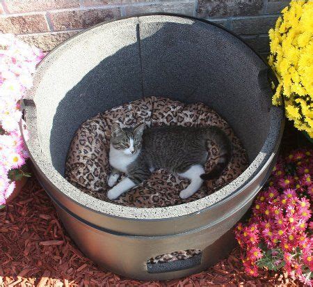 We have two stray cats that like to hang out around our backyard and thought it would be nice to give them something a little warmer to be in when the days and nights get cold. The Kitty Tube Fully Insulated Cat House Gives Refuge To ...