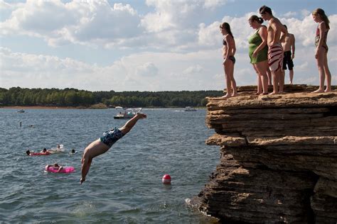 Greers Ferry Lake Jumping Off The Cliffs At The Dam Site