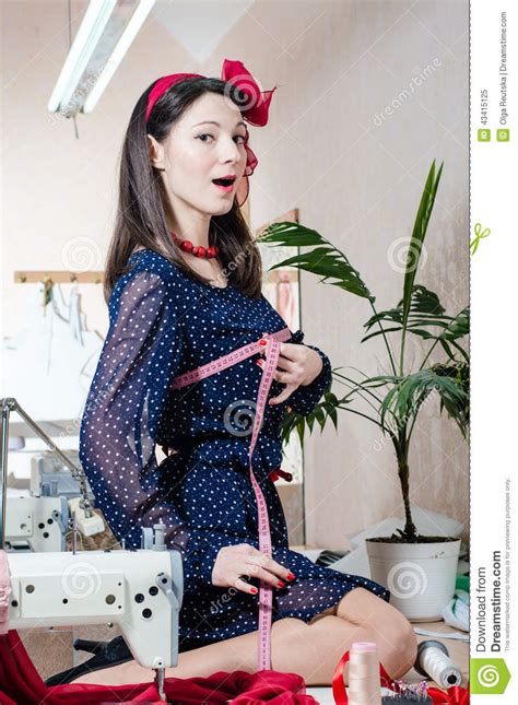 Sewing Clothes In Workshop Beautiful Brunette Young Woman