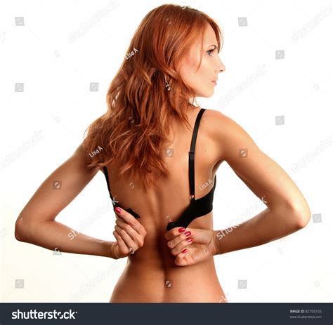 Slim Woman Taking Off Her Bra Stock Photo 82755103 Shutterstock