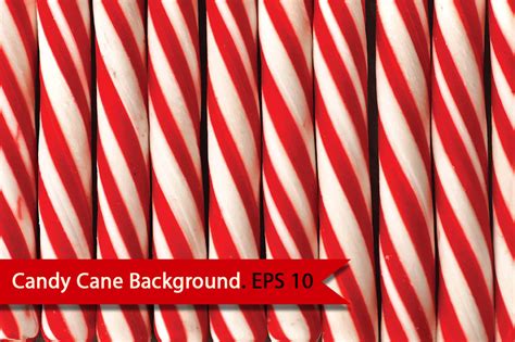 Christmas candy cane with a bow on white chevron textured fabric background. Christmas Candy Cane background ~ Textures on Creative Market
