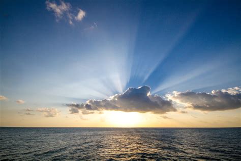 Picture Of Sun Setting Over Ocean Free Stock Photo