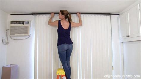 How To Hang Curtains To Conceal Vertical Blinds Engineer Your Space