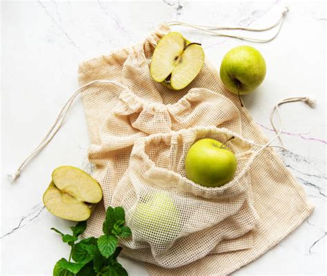 Mesh Bag Of Fruit Stock Photos Pictures And Royalty Free Images Istock