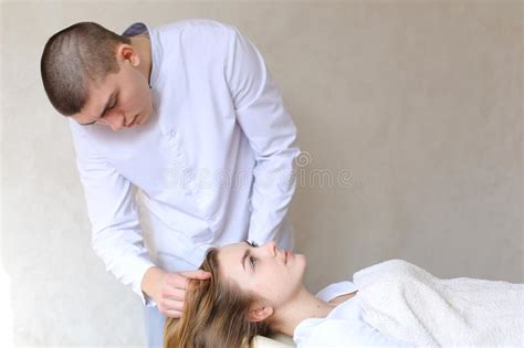 Handsome Guy Massage Therapist Doing Head Massage For Girl Clien Stock Image Image Of Health