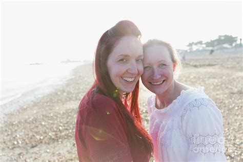 Portrait Lesbian Couple On Beach Photograph By Caia Imagescience Photo