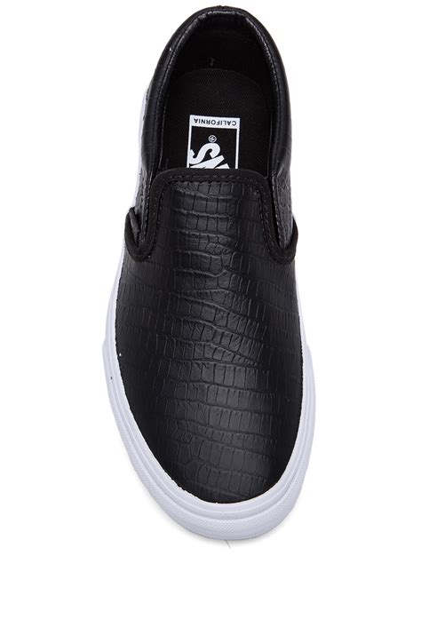 Shop for black slip on, popular shoe styles, clothing, accessories, and much more! Vans Classic Croc Leather Slip-On Sneakers in Black - Lyst