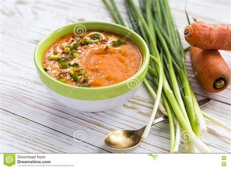 Carrot Puree Soup With Sour Cream And Green Onion Stock