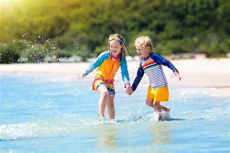 Kids On Tropical Beach Children Playing At Sea Stock Photo Image Of