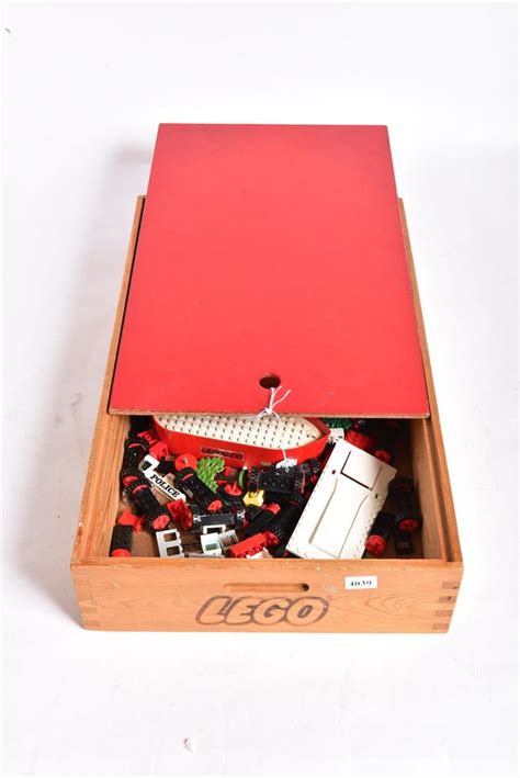 A Wooden Lego Box Containing A Collection Of Vintage Lego Pi