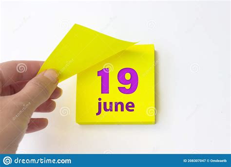 June 19th Day 19 Of Month Calendar Date Hand Rips Off The Yellow