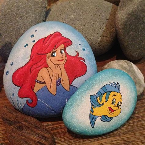 However, it's important to distinguish between the work of a professional artist and a hobbyist. Disney's The Little Mermaid on painted rocks #rockpainting ...