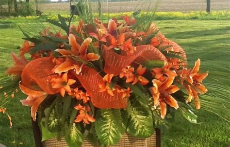 Is to hold clothes to a position. Orange headstone saddle for Memorial Day decoration ...