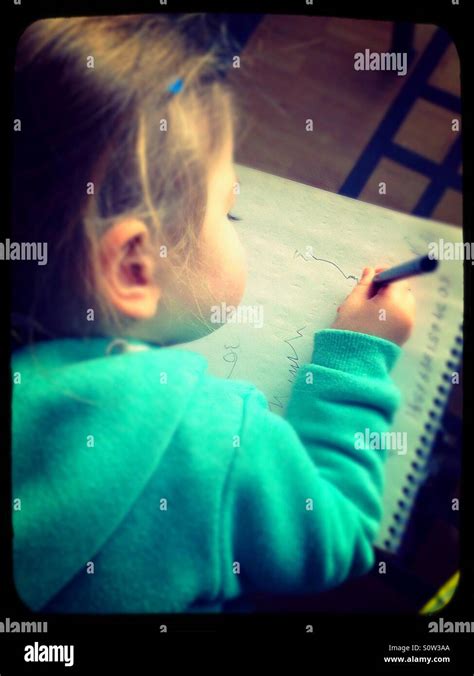 Young Girl Writing Stock Photo Alamy
