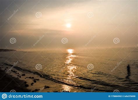 Sunrise In The Beautiful Ocean With The Suns Reflection In The Ocean
