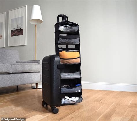 The Incredible Carry On Suitcase That Can Be Folded Out Into A Wardrobe