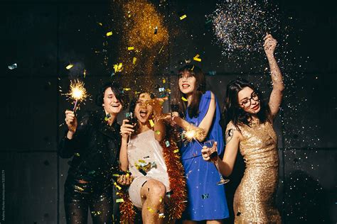 Four Female Posing With Sparklers By Stocksy Contributor Andrey