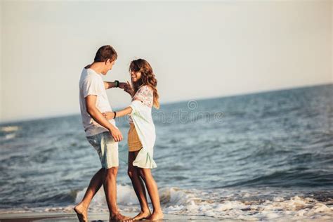 Couple In Love On The Beach Handsome Young Man With Girlfriend On