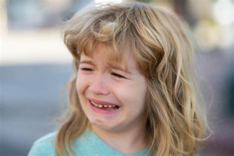 Portrait Of Crying Kid With Tears Weeping Emotion Hurt In Pain Tear