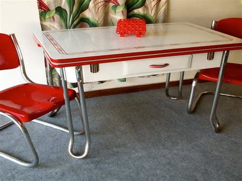 Retro style kitchen table and chairs. A Beautiful Chrome and porcelain Kitchen Table with a ...